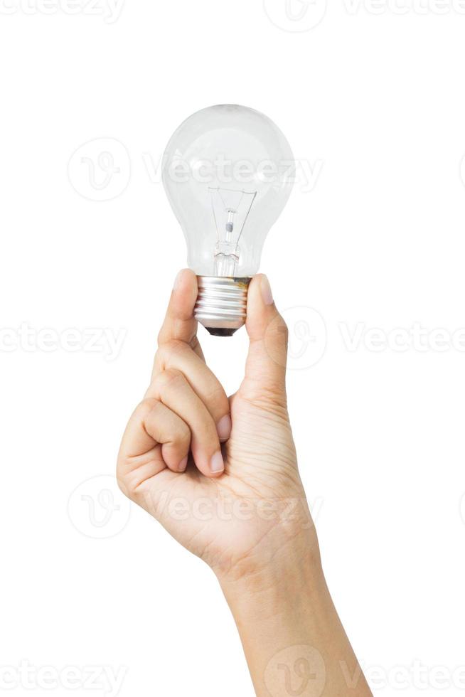 mano destra della donna che tiene la lampadina foto
