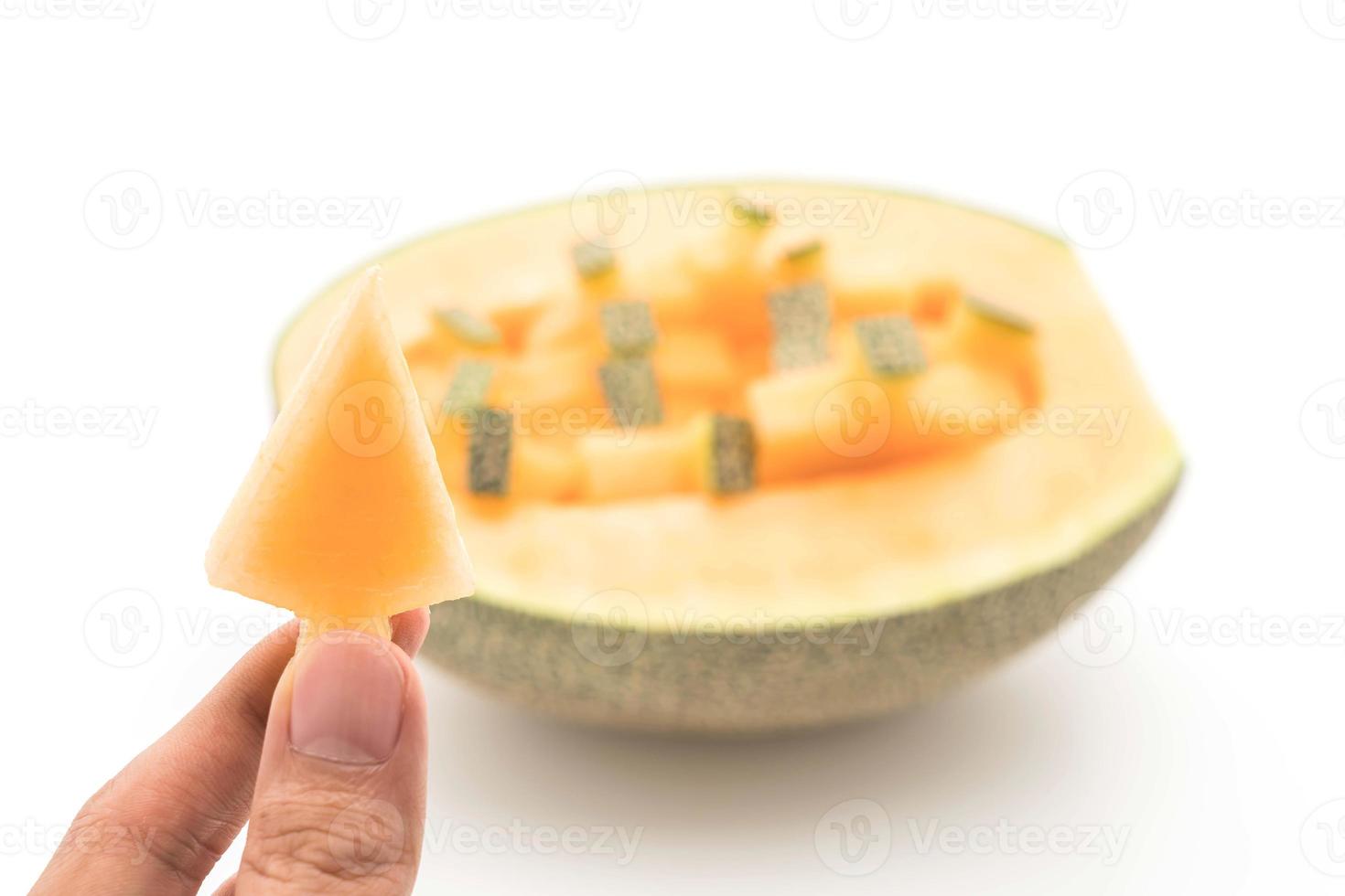 melone cantalupo su sfondo bianco foto