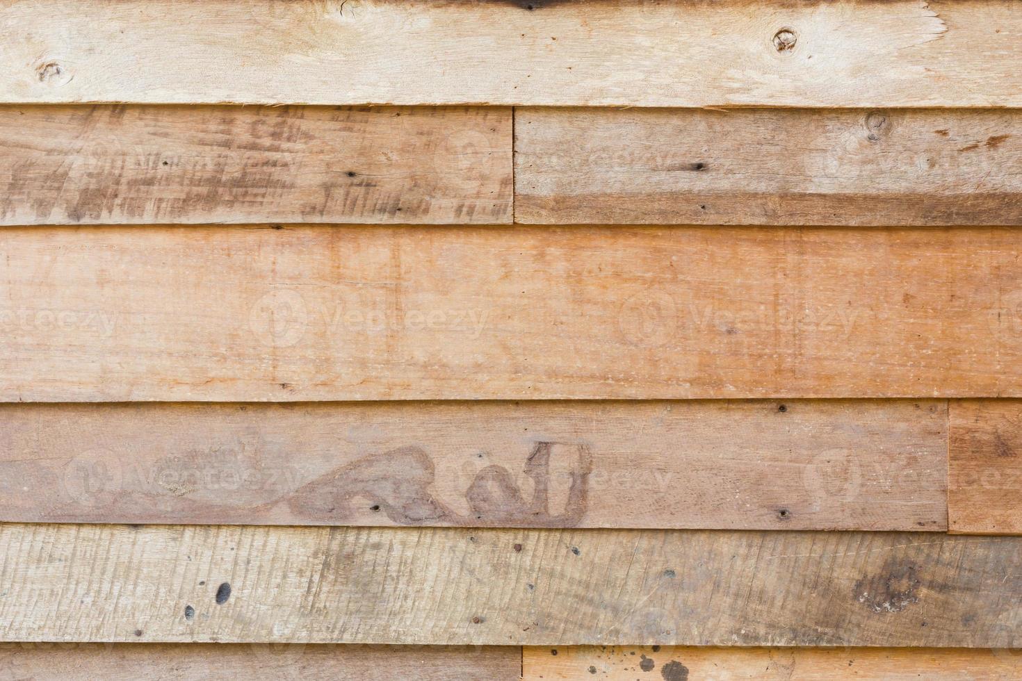 fondo di struttura della parete della plancia di legno marrone grungy foto