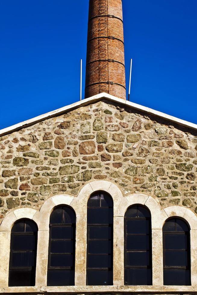 costruzione di fabbrica di mattoni in pietra camino foto