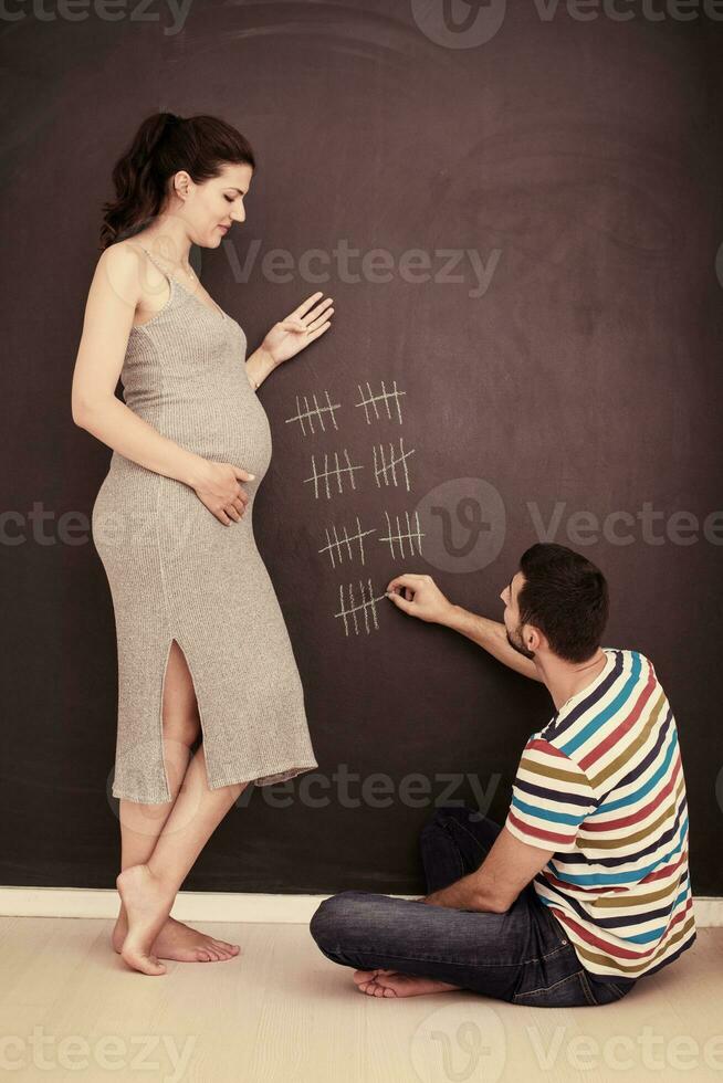 incinta coppia conti settimana di gravidanza foto