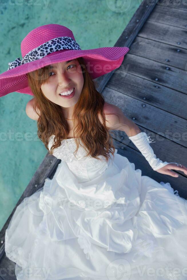 asiatico sposa su spiaggia foto