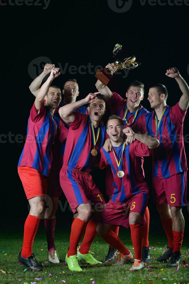 calciatori che celebrano la vittoria foto