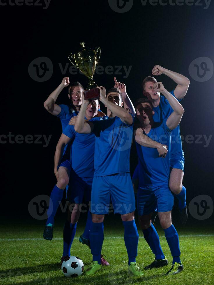 calciatori che celebrano la vittoria foto