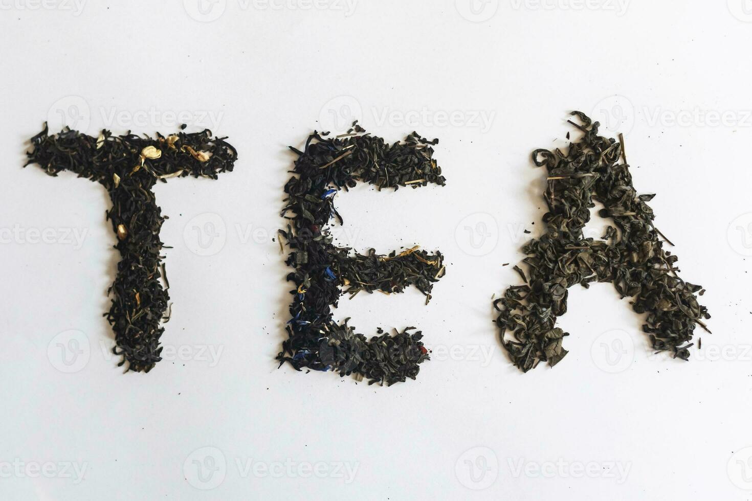 il parola tè fatto con asciutto tè foglie foto