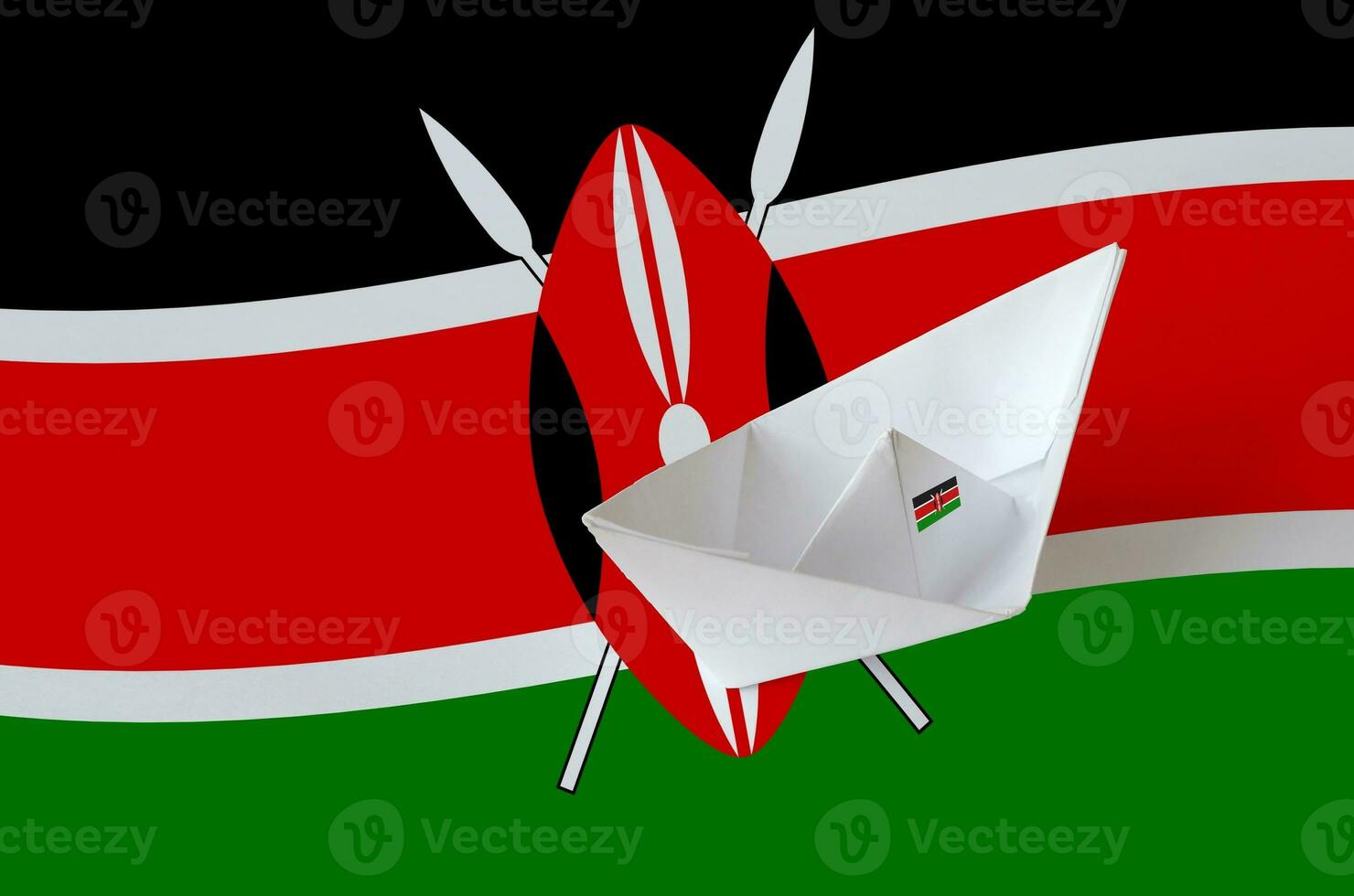 Kenia bandiera raffigurato su carta origami nave avvicinamento. fatto a mano arti concetto foto