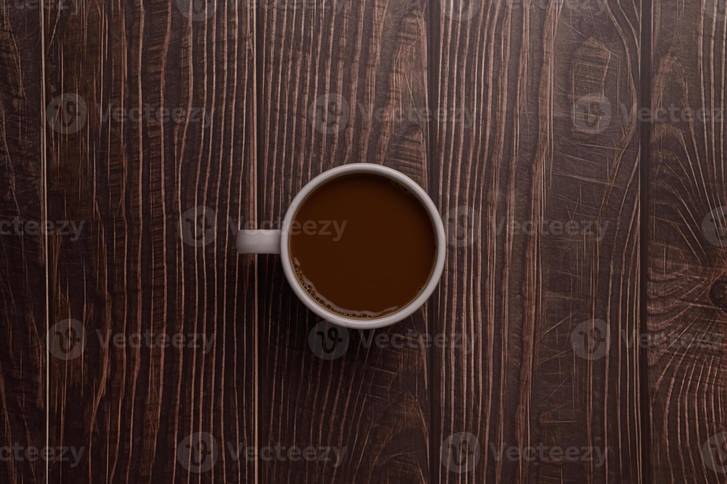 tazza da caffè su fondo in legno foto