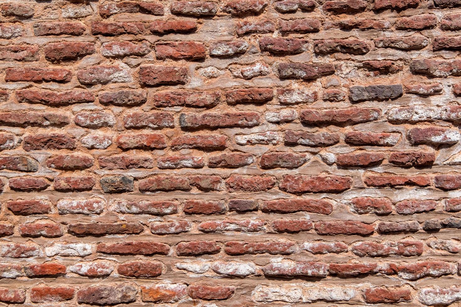 fondo di struttura del muro di mattoni rossi. foto