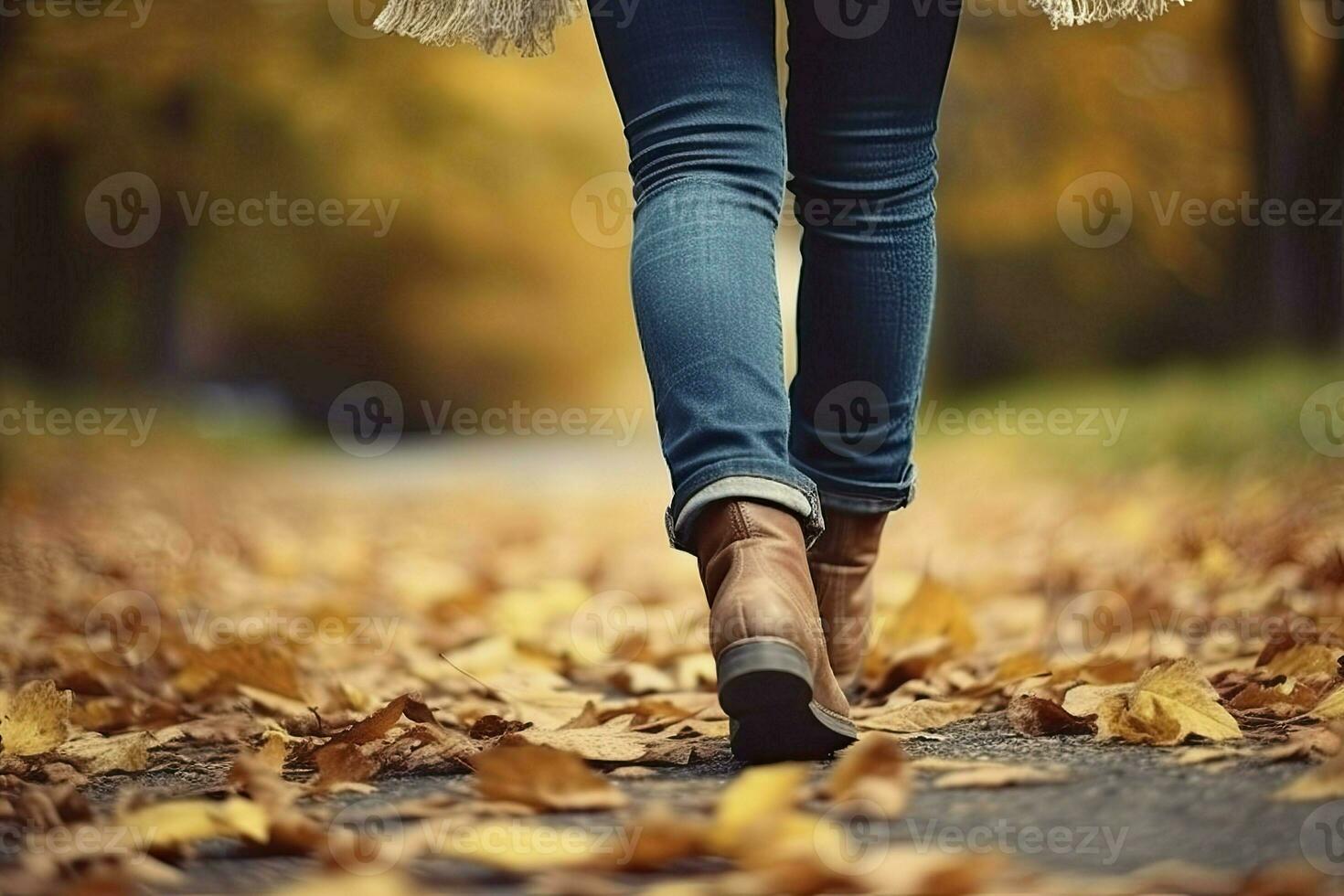 donna nel jeans e stivali a piedi su autunno parco. avvicinamento di il piedi. autunno moda concetto, autunno tendenza. generativo ai foto