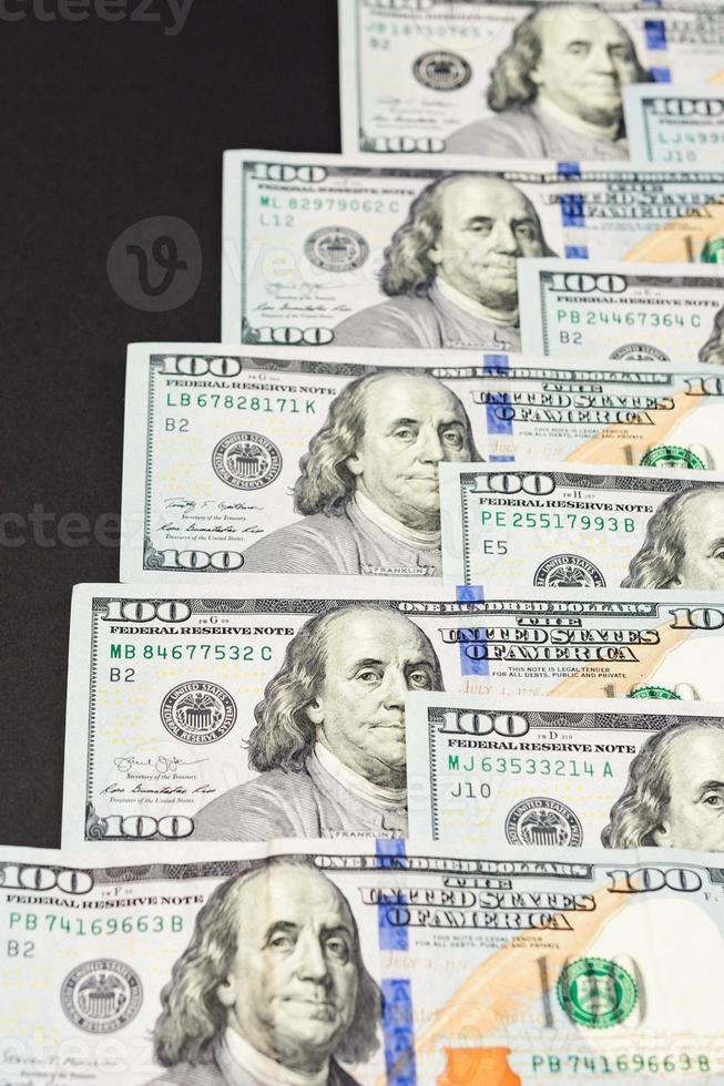 trama del dollaro di 100, benjamin franklin e contanti americani. foto