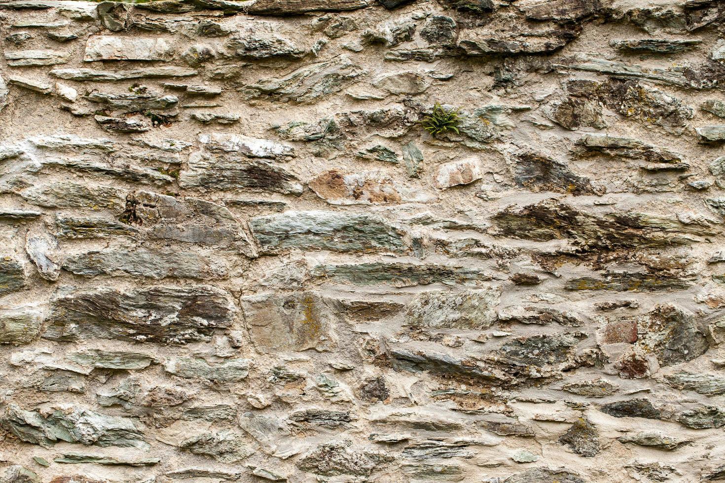 struttura del fondo del muro di mattoni di pietra del grunge foto