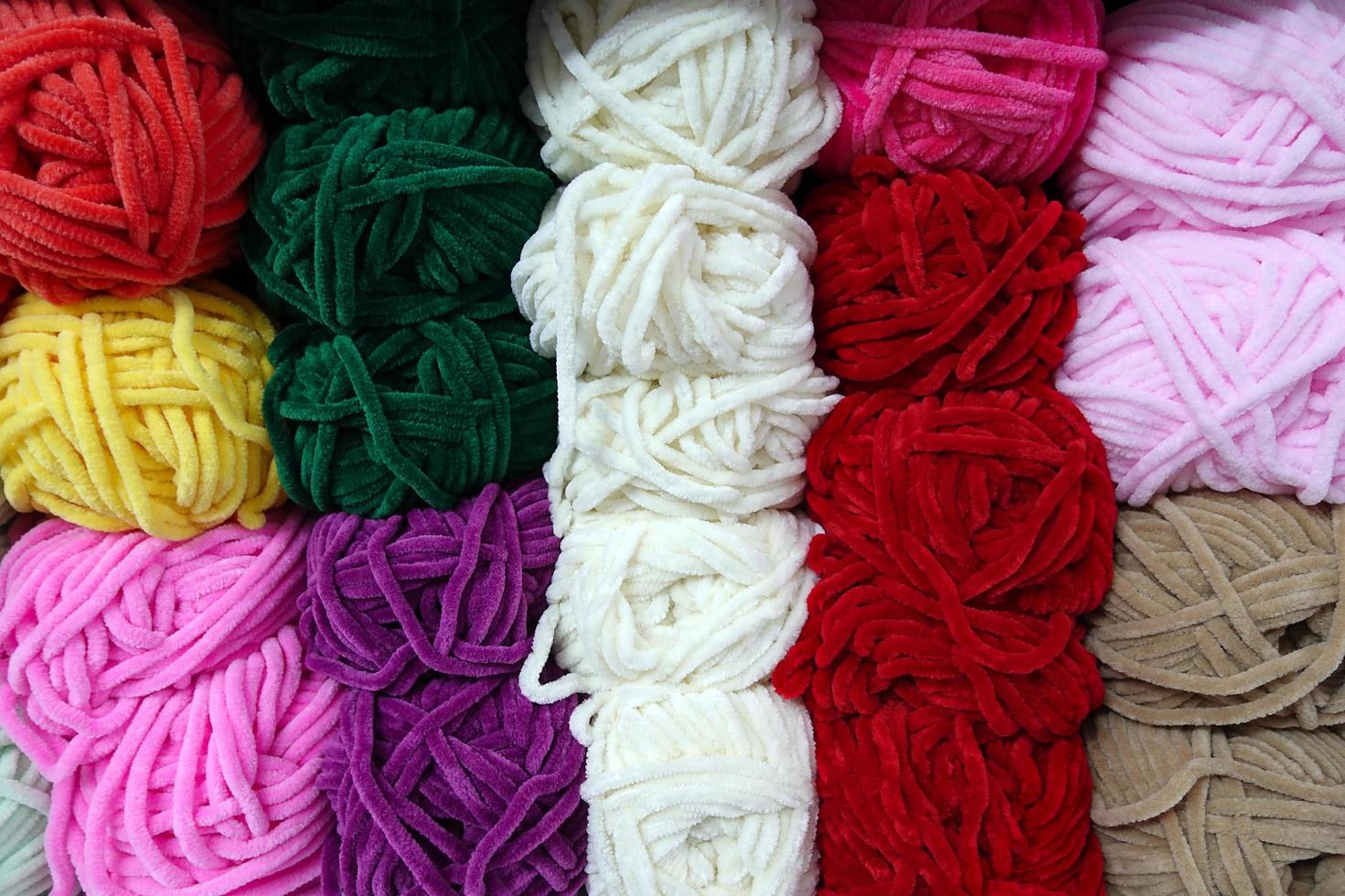 rotoli di tessuto industriale in materiale tessile colorato in cotone foto