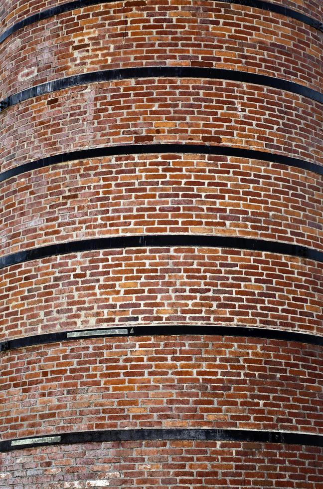 costruzione di fabbrica di mattoni in pietra camino foto