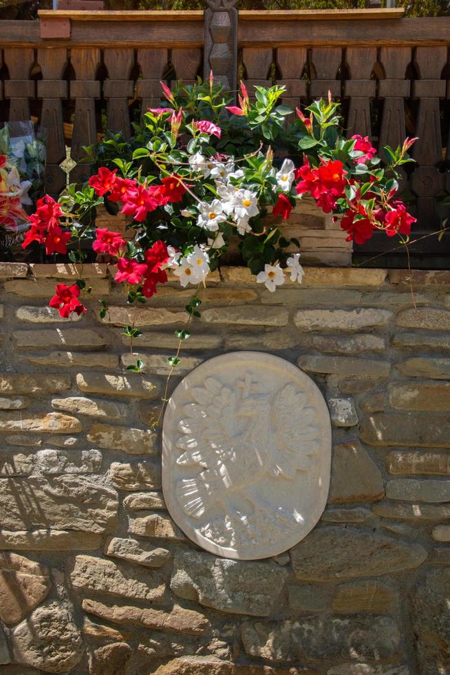 emblema del muro di pietra foto