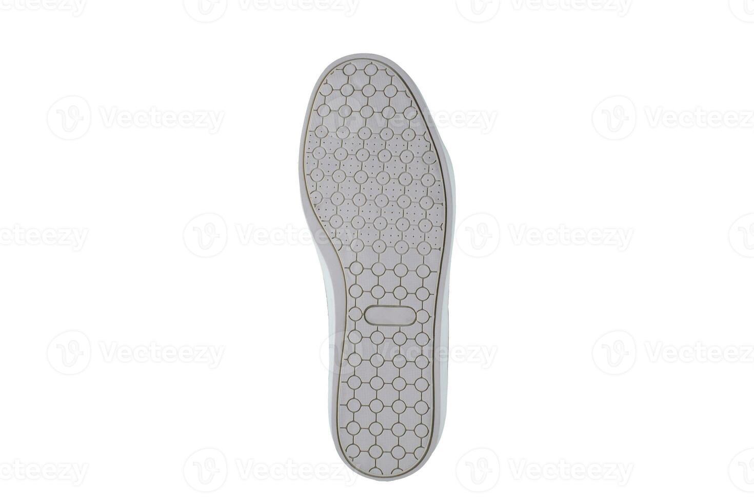 bianca gomma da cancellare suola con scarpe da ginnastica su un' bianca sfondo. foto