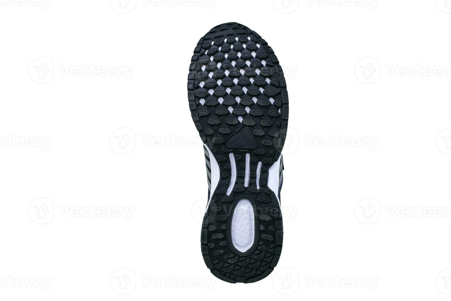 nero suola scarpe da ginnastica con bianca strisce su un' bianca sfondo. foto