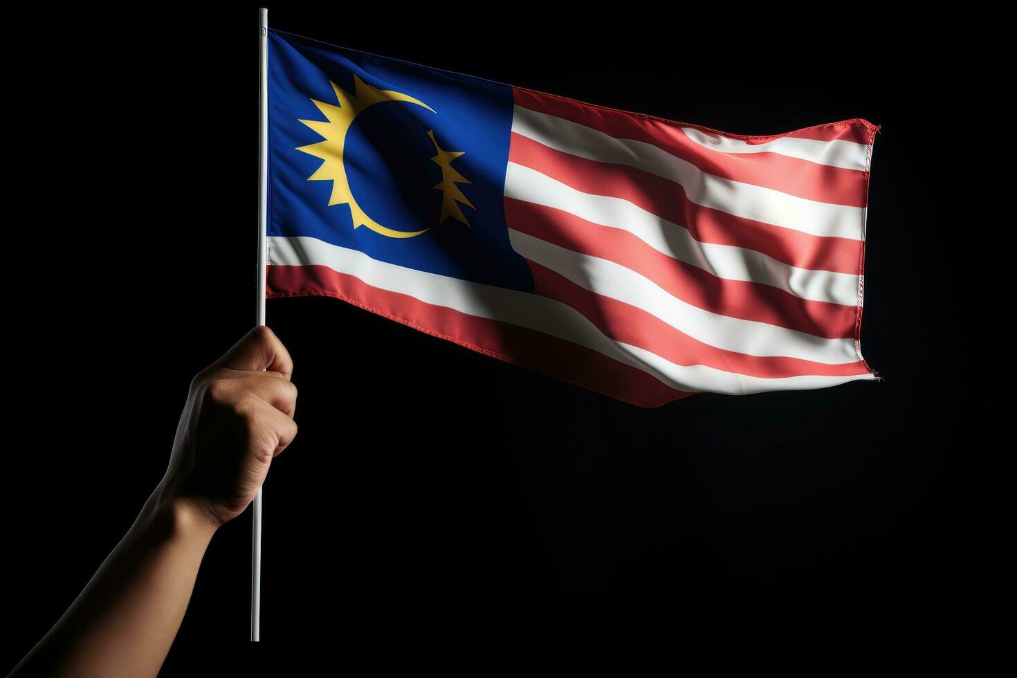 mano Tenere Malaysia bandiera, isolato su Nero, politico concetto, mano agitando Malaysia bandiera anche conosciuto come jalur gemilang nel congiunzione, ai generato foto