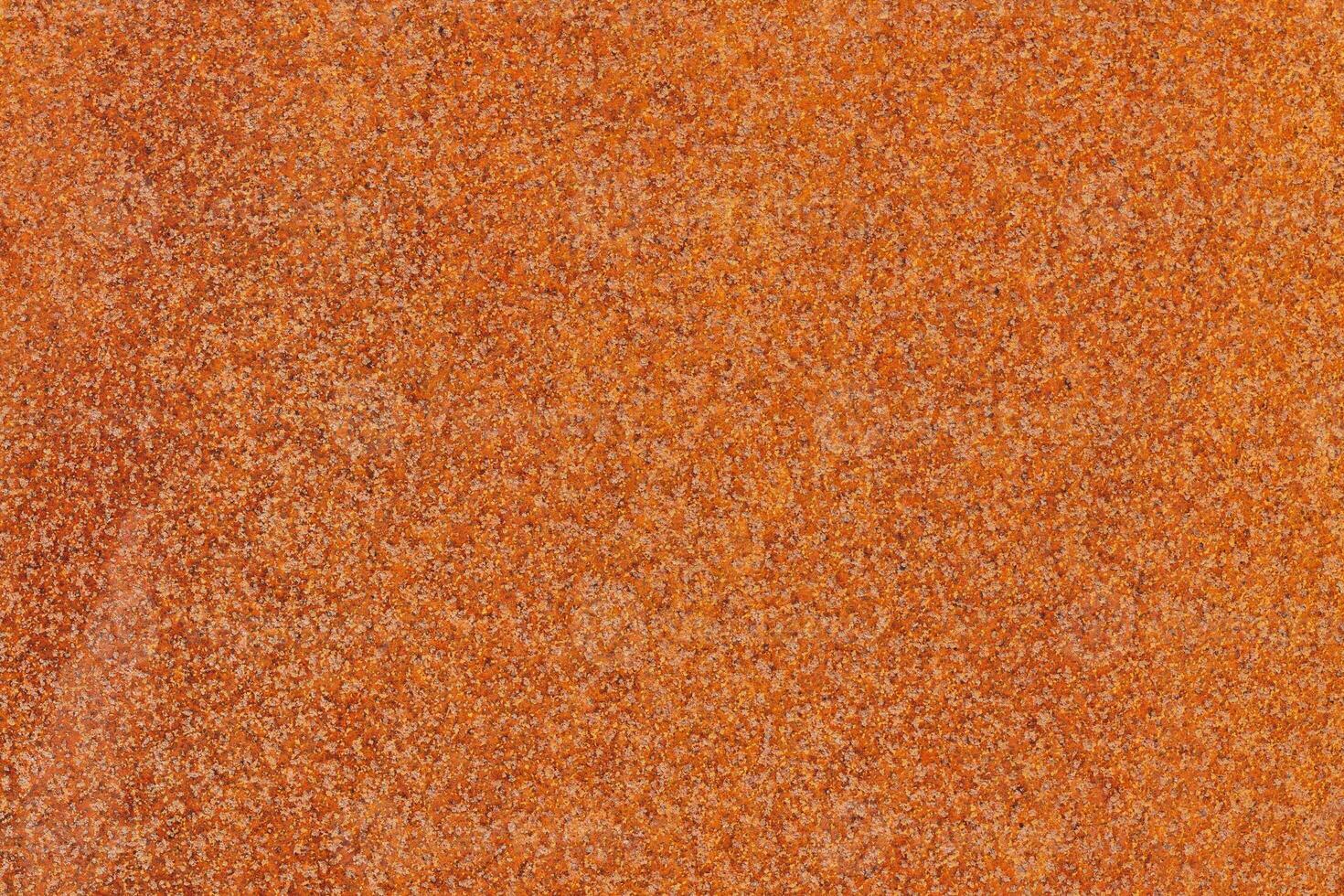punteggiato vecchio arrugginito metallo superficie giallo-arancione colore. vicino su macro Visualizza di modello struttura o sfondo foto