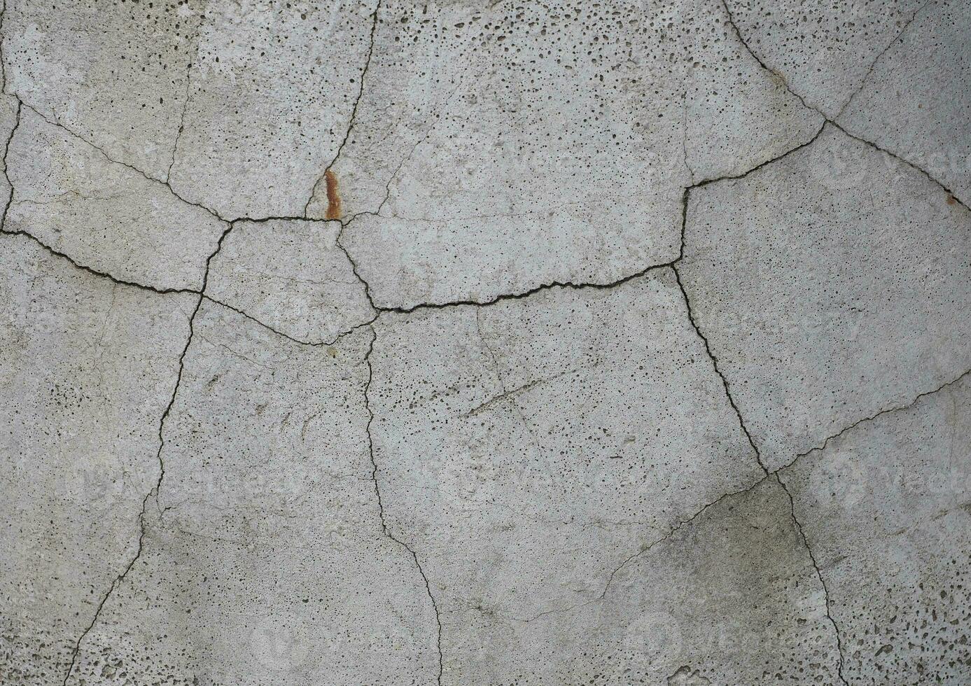 Cracked Esposto alle intemperie calcestruzzo struttura sfondo foto