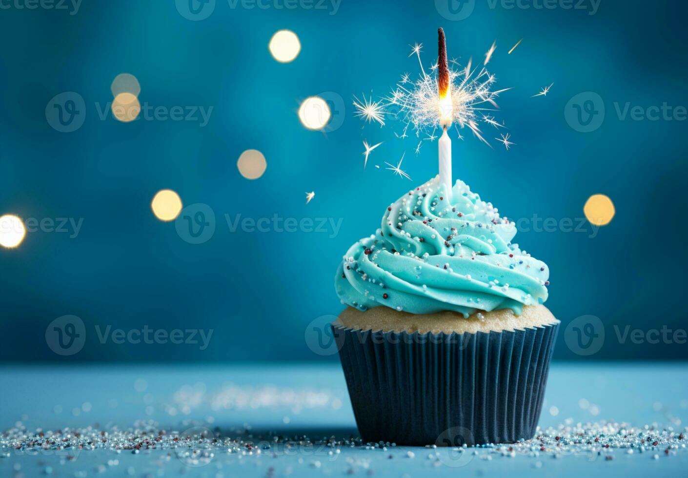compleanno Cupcake con un' candela e festivo orpello decorazione su un' blu sfondo con copia spazio ai generativo foto