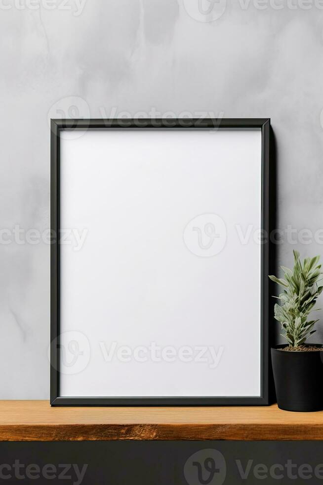 vuoto verticale immagine telaio modello sospeso su un' pianura parete con di legno scrivania tavolo e fiore vaso ai generato foto