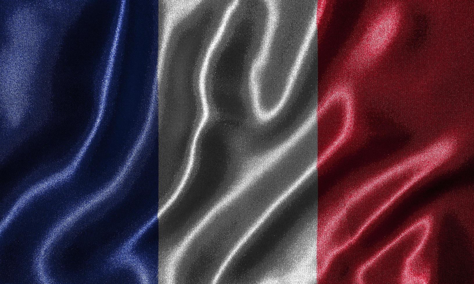 carta da parati della bandiera della francia e sventolando la bandiera del tessuto. foto