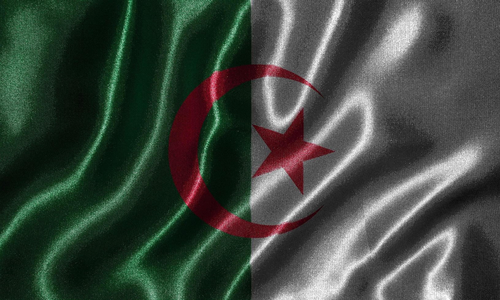 carta da parati della bandiera dell'algeria e sventolando la bandiera del tessuto. foto