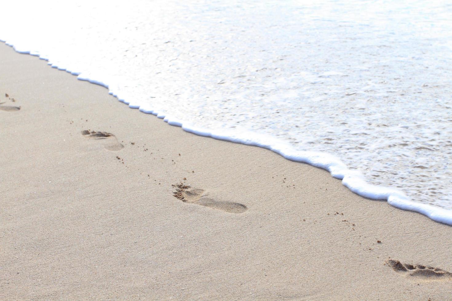 impronta sulla spiaggia di waikiki beach hawaii foto