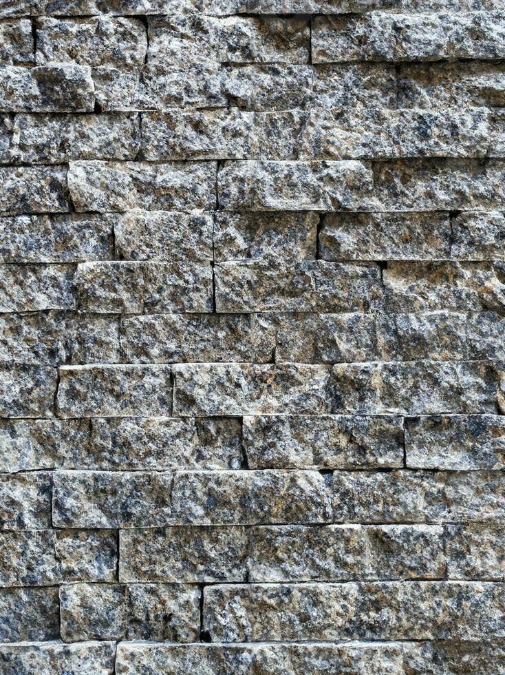 moderno pietra mattone parete sfondo. pietra struttura. foto