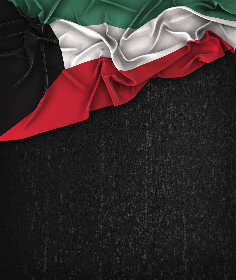 bandiera kuwait vintage su una lavagna nera grunge con spazio per il testo foto