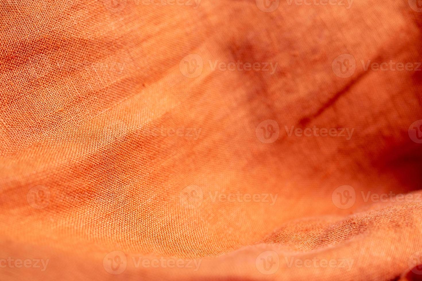 fondo di struttura del tessuto di lino arancione foto