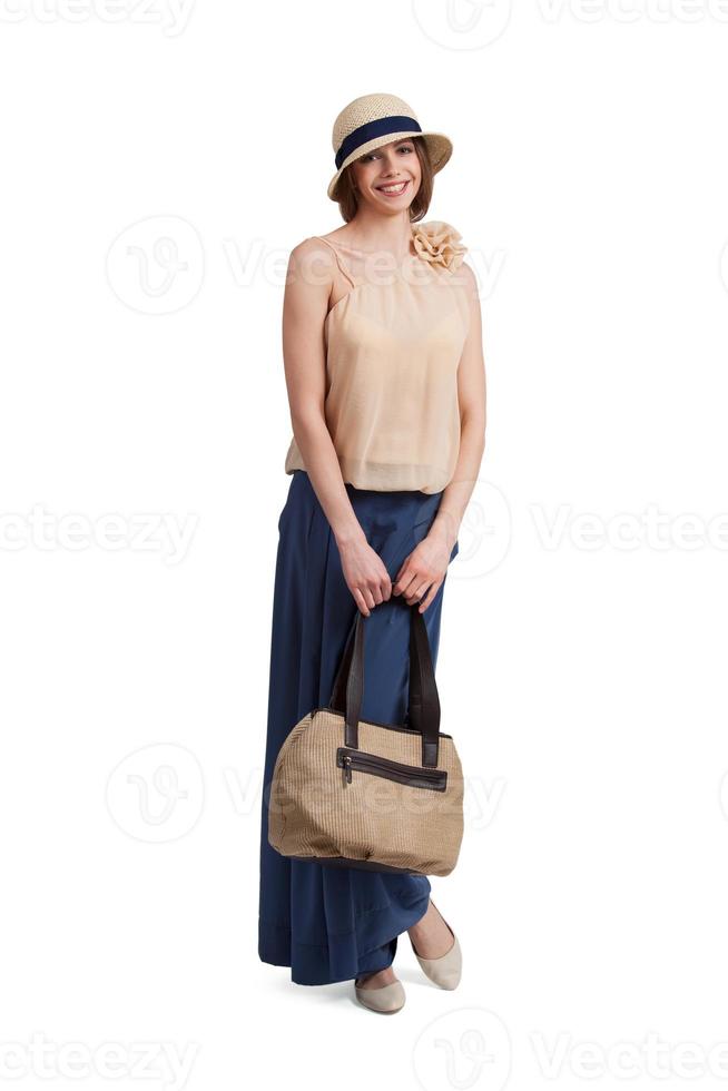 bella donna elegante con una borsa foto