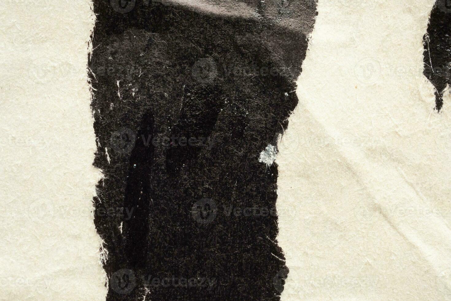 vecchio grunge strappato strappato nero carta manifesto superficie struttura sfondo foto