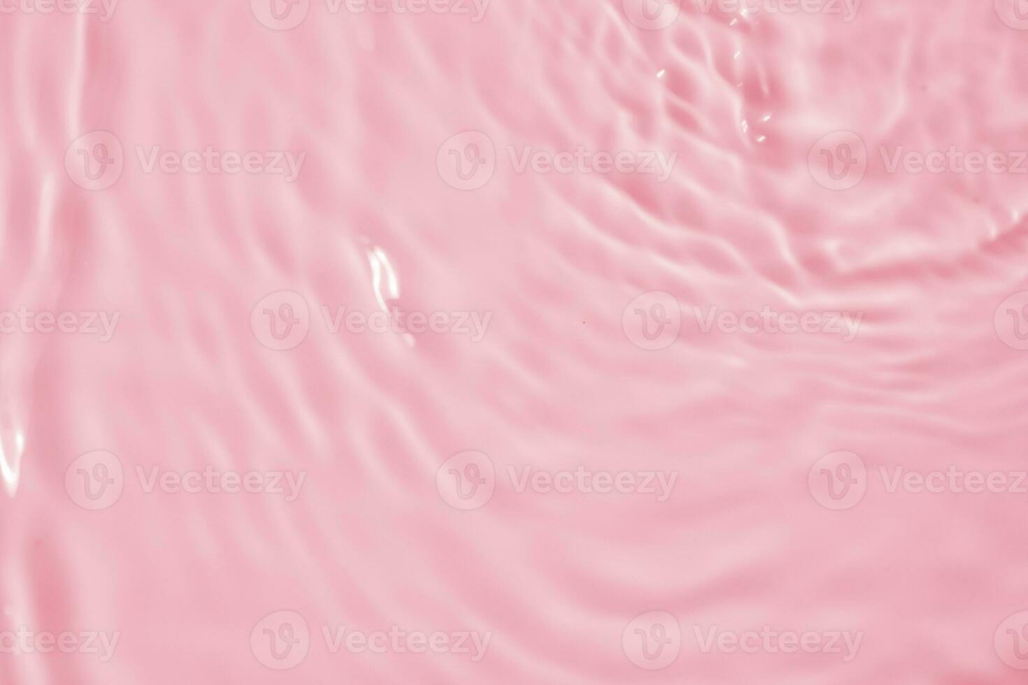 astratto trasparente acqua ombra superficie struttura naturale ondulazione su rosa sfondo foto