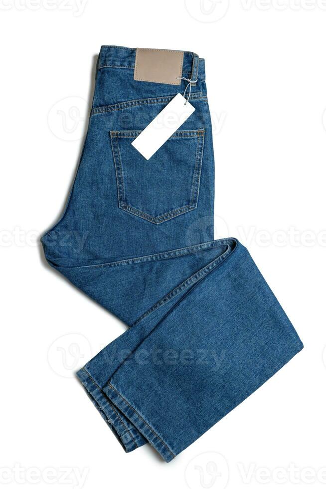blu jeans pantaloni e prezzo etichetta isolato su bianca sfondo, modello, copia spazio foto