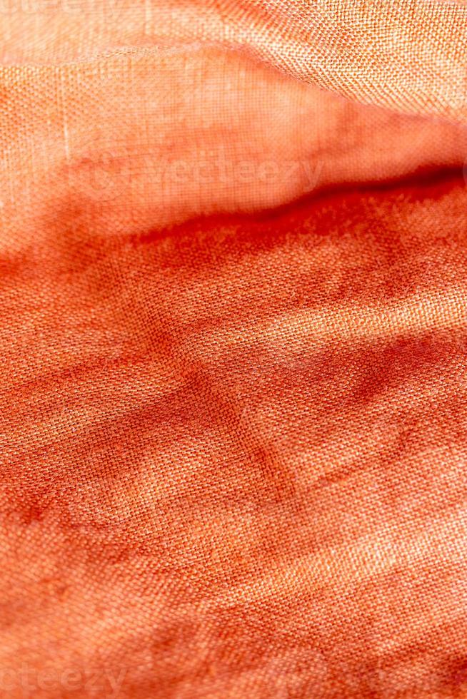 fondo di struttura del tessuto di lino arancione foto