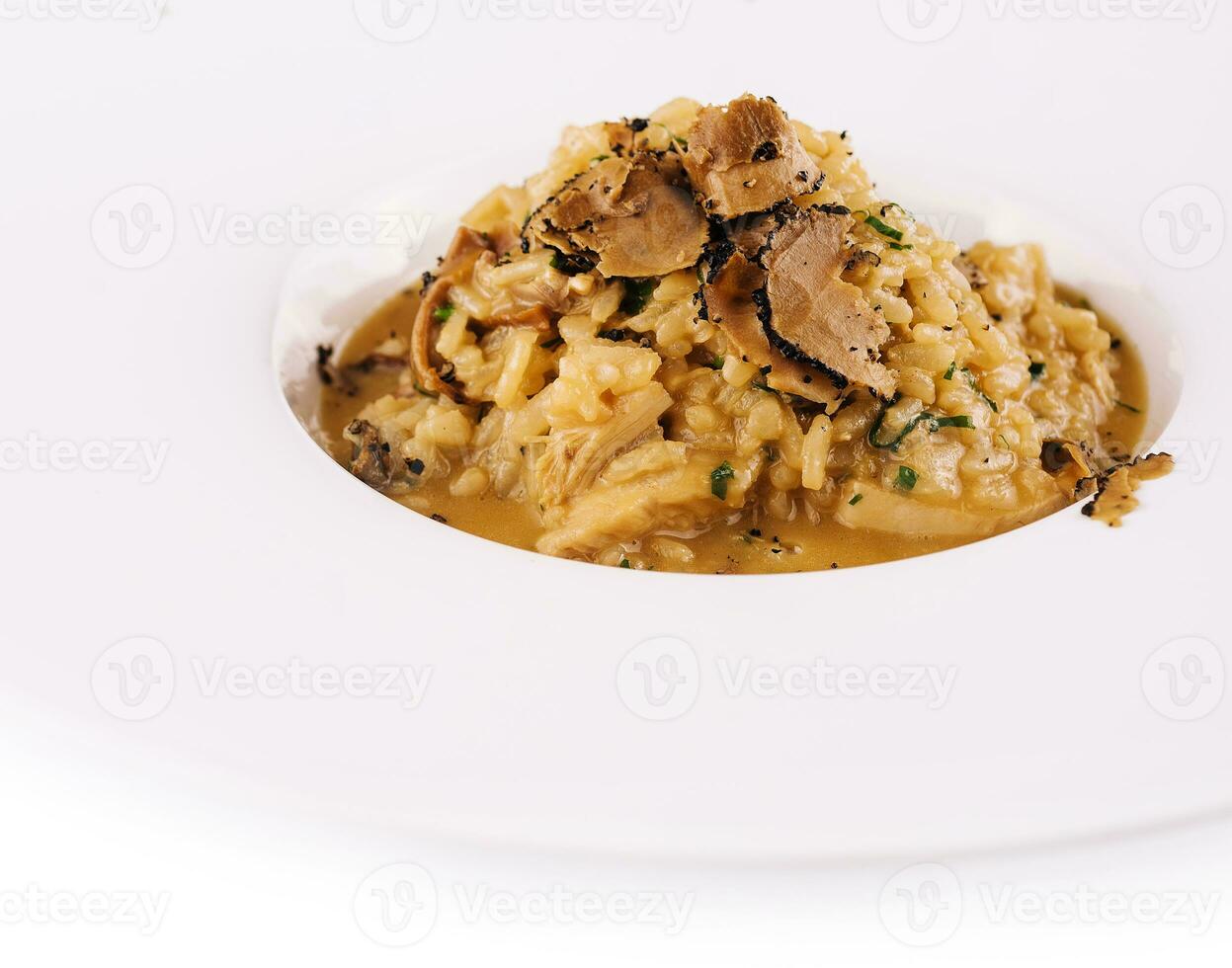 cremoso formaggio risotto con fette di tartufo foto