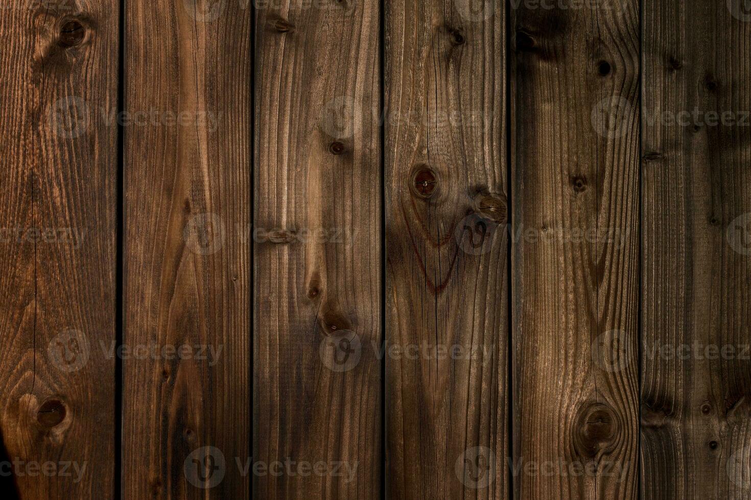 Marrone di legno sfondo. buio struttura di vecchio legna foto