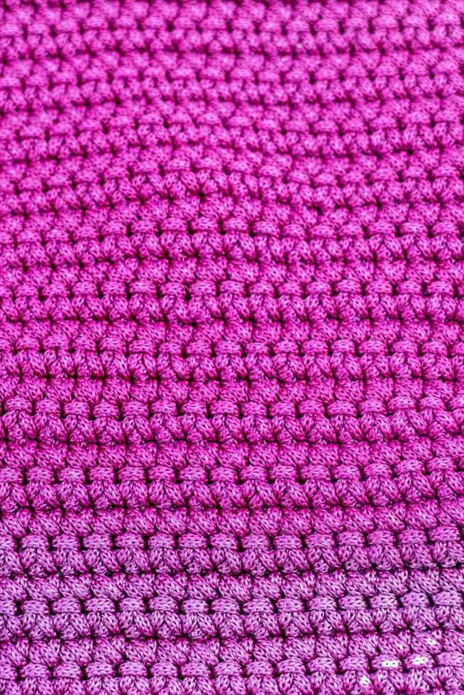 rosa a maglia tessuto come un' sfondo. avvicinamento. struttura foto