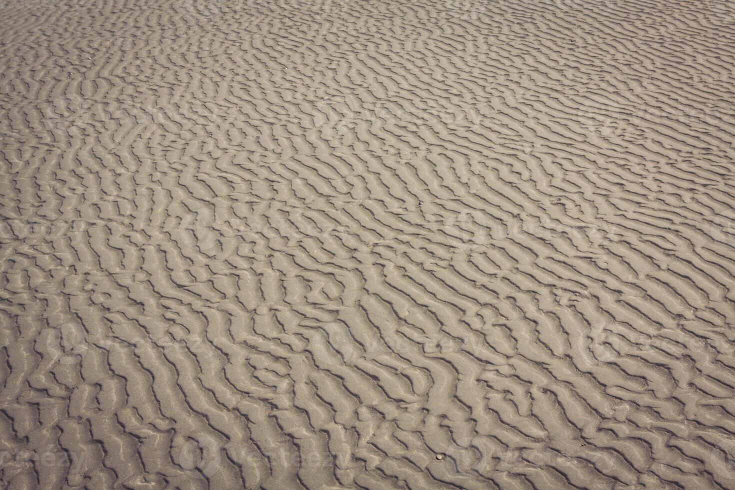 vicino su di mare spiaggia sabbia o deserto sabbia per struttura e sfondo foto