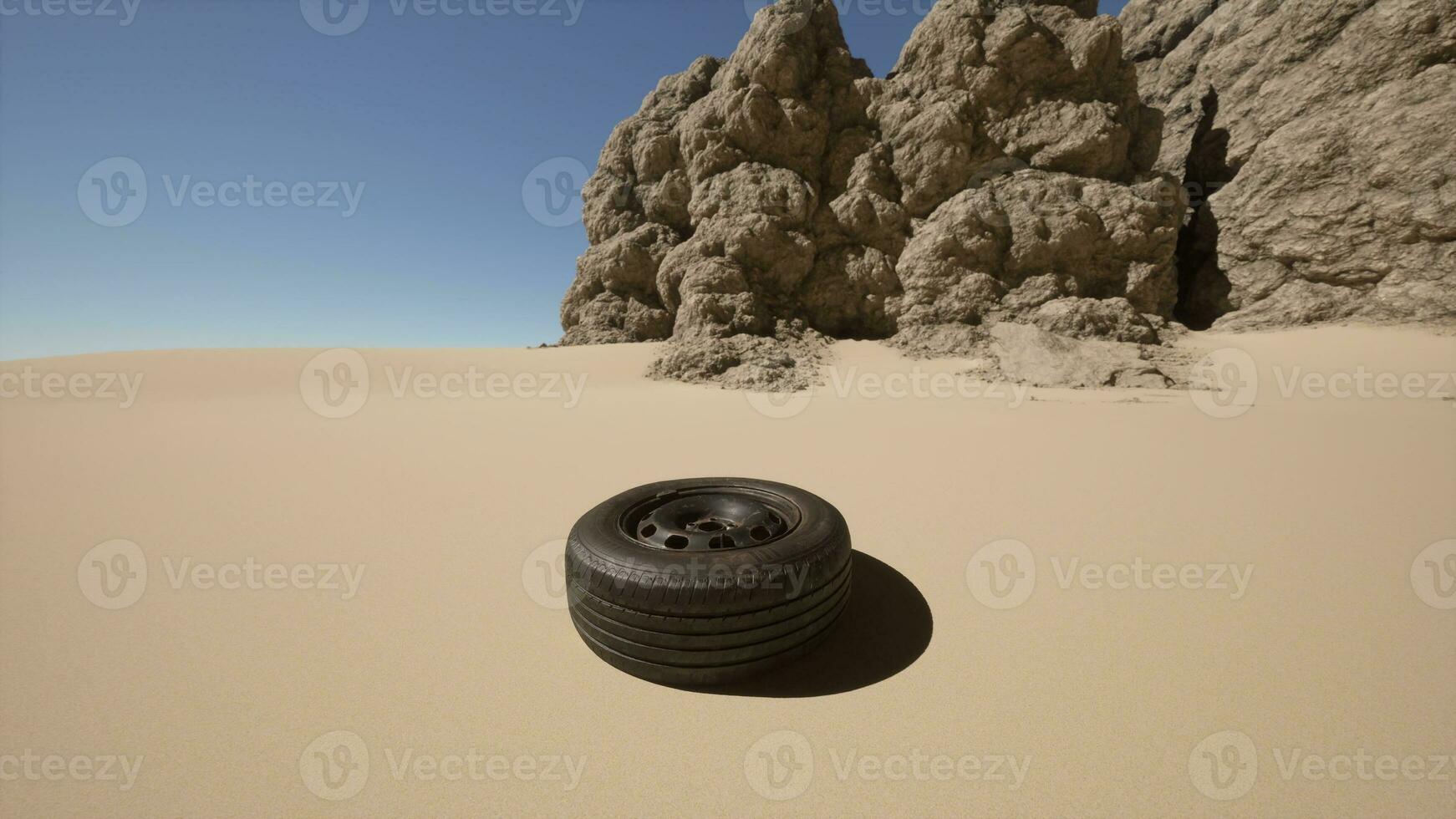un' pneumatico seduta nel il mezzo di un' deserto foto