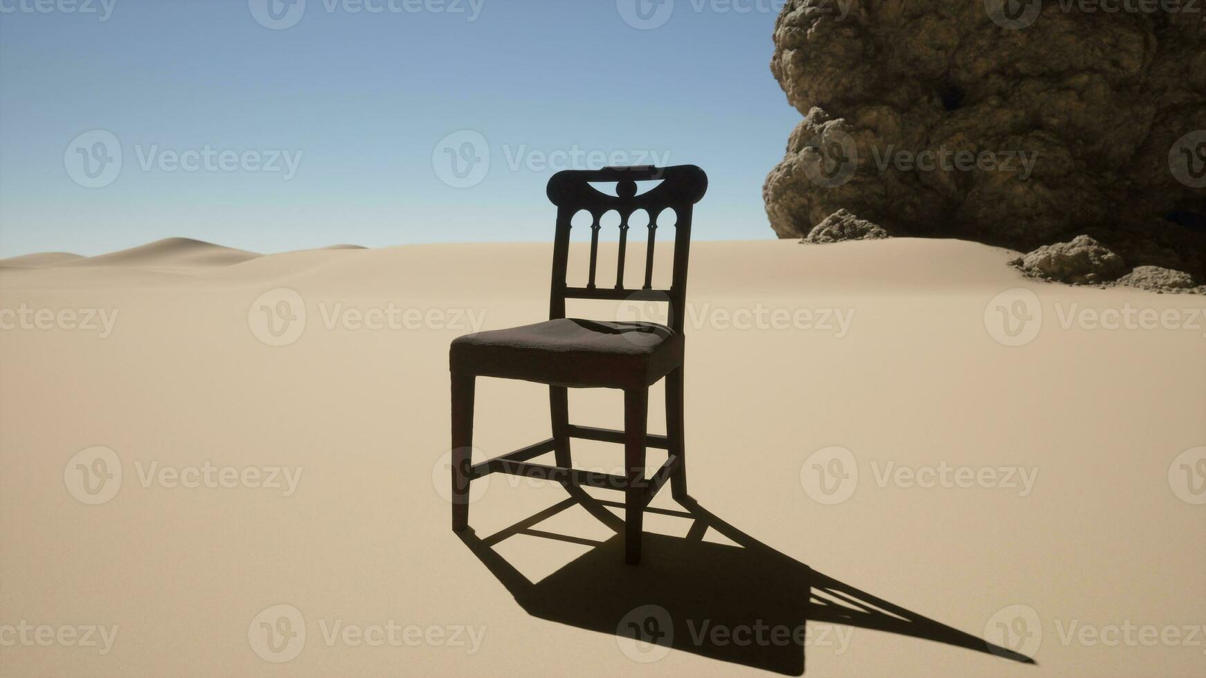 un' sedia seduta nel il mezzo di un' deserto foto