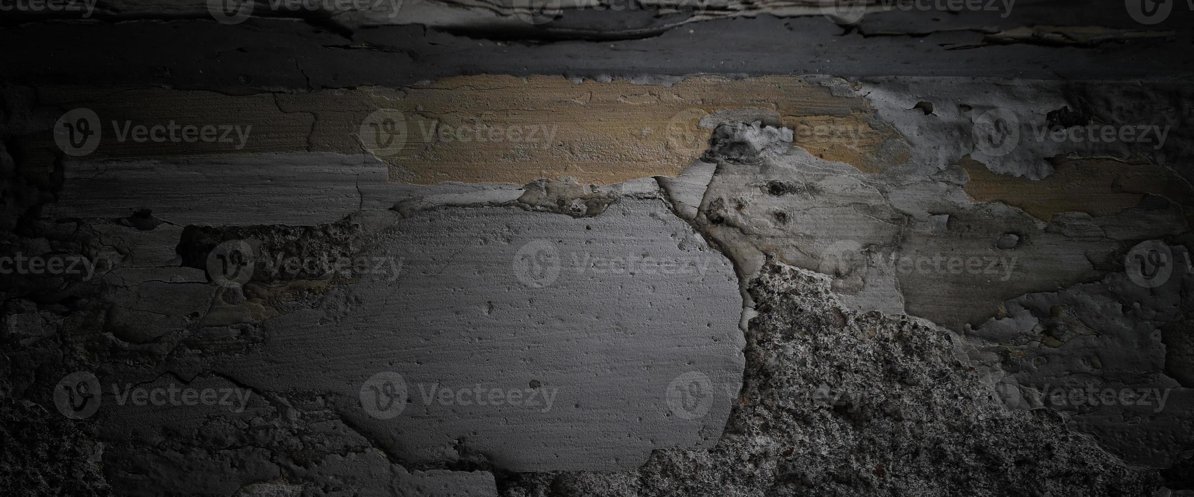 trama di cemento horror. sfondo spaventoso grunge. muro di cemento vecchio nero foto