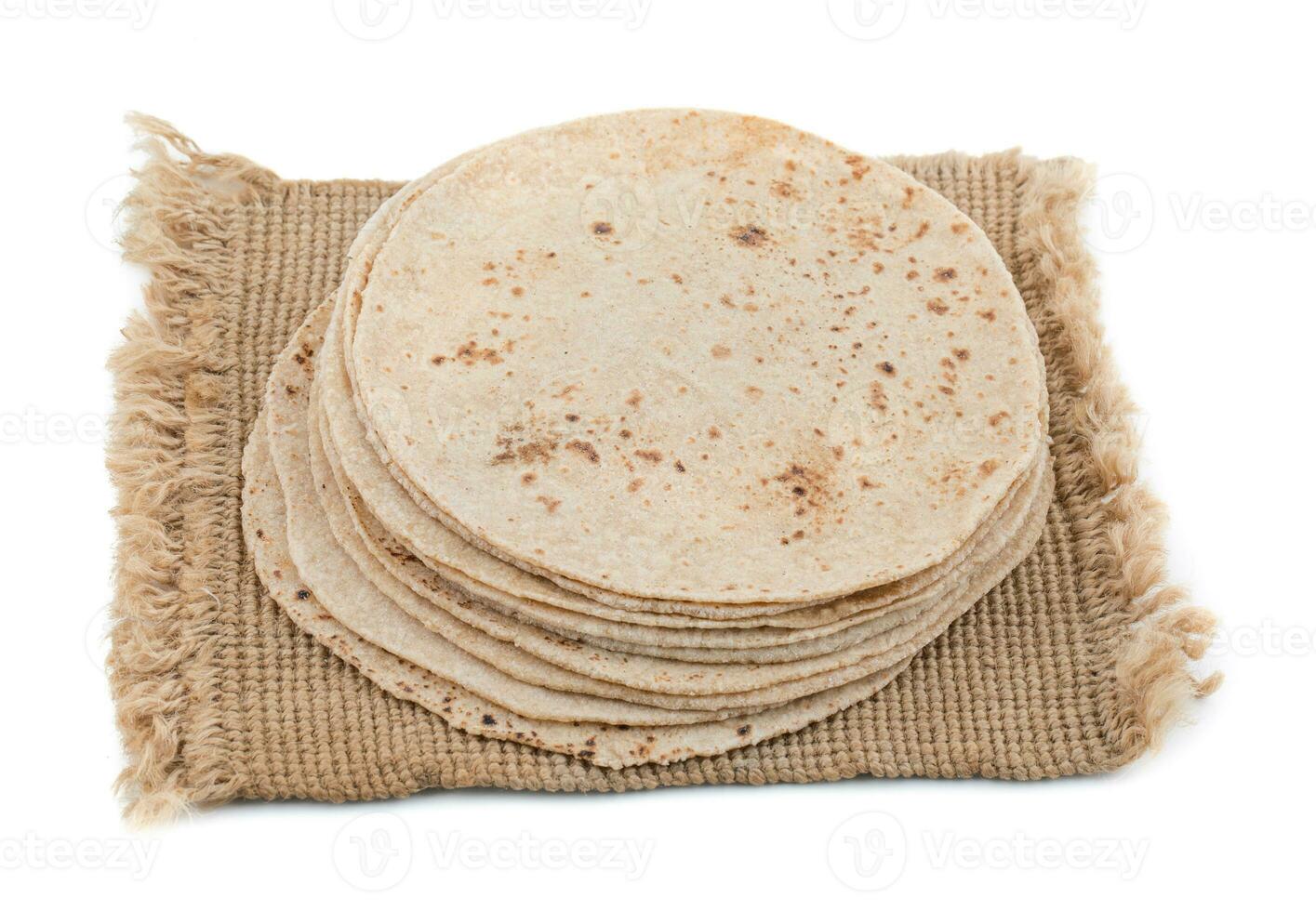 indiano tradizionale cucina chapati su bianca sfondo foto