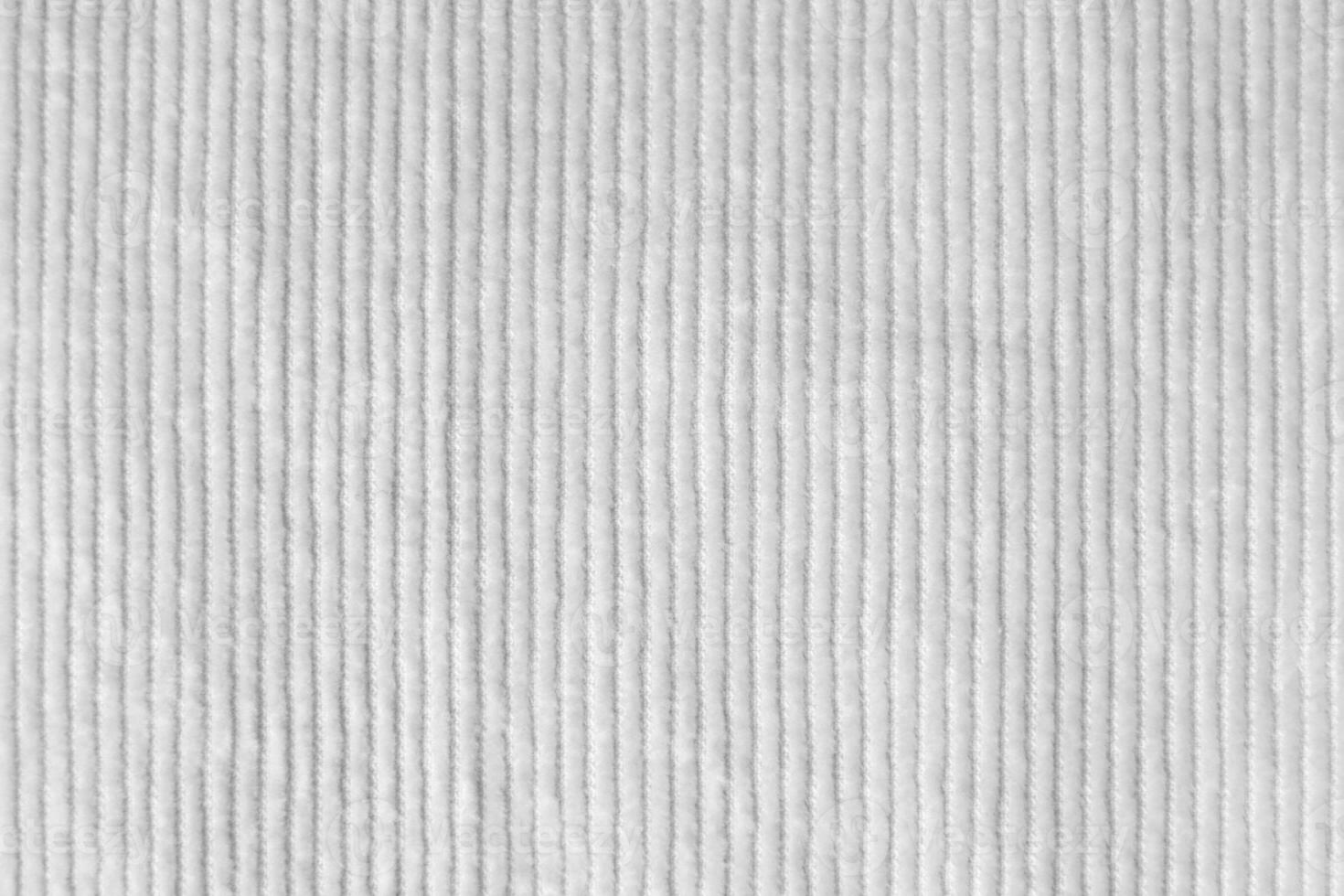 bianca velluto a coste tessuto struttura Usato come sfondo. pulito tessuto sfondo di morbido e liscio tessile Materiale. stoffa, velluto, .lusso bianca tono per seta. foto