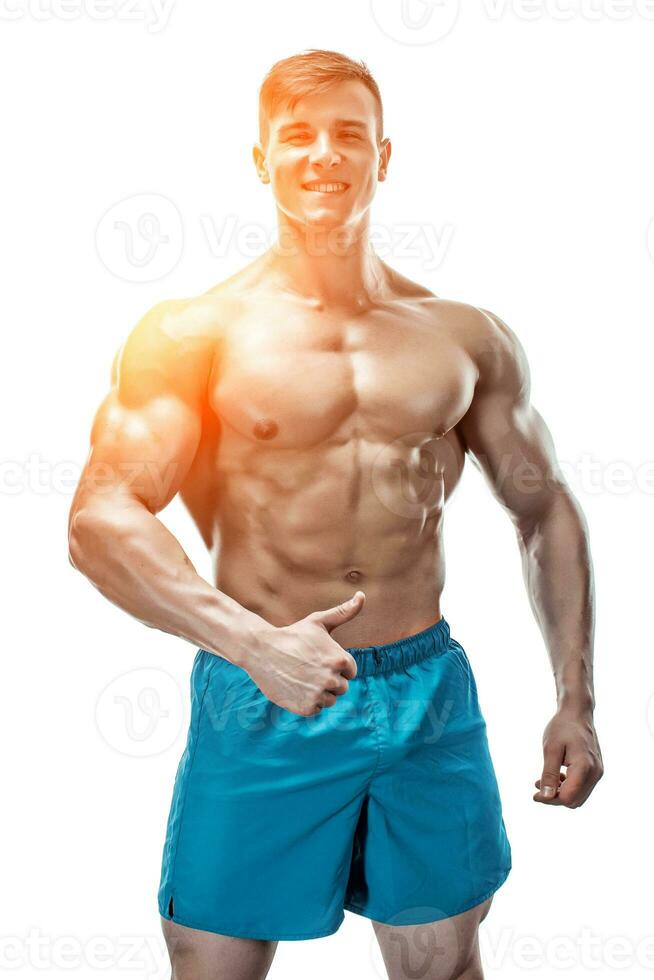 Immagine di muscolo uomo in posa nel studio foto