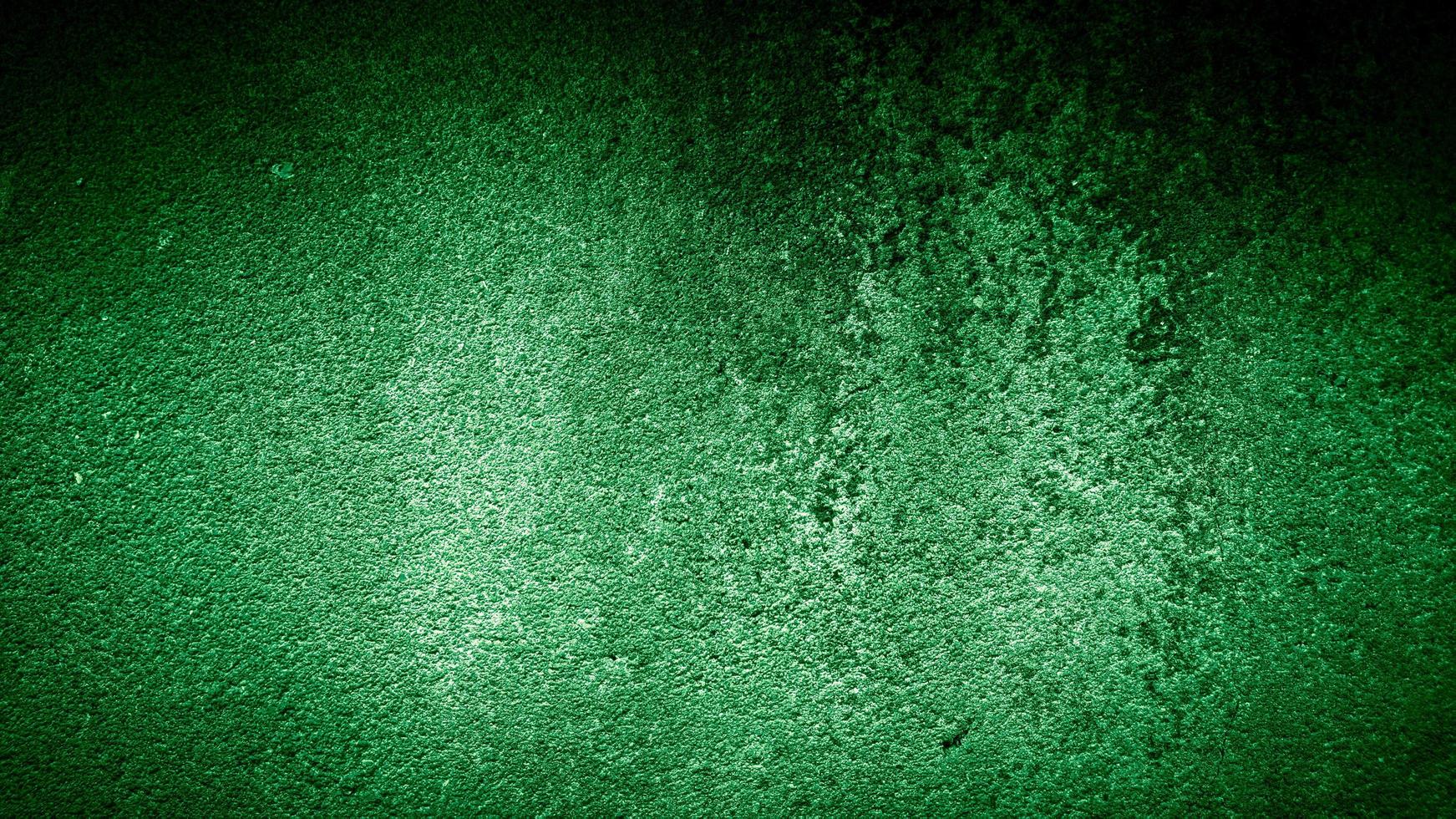 sfondo grunge della parete verde colorata. sfondo astratto foto