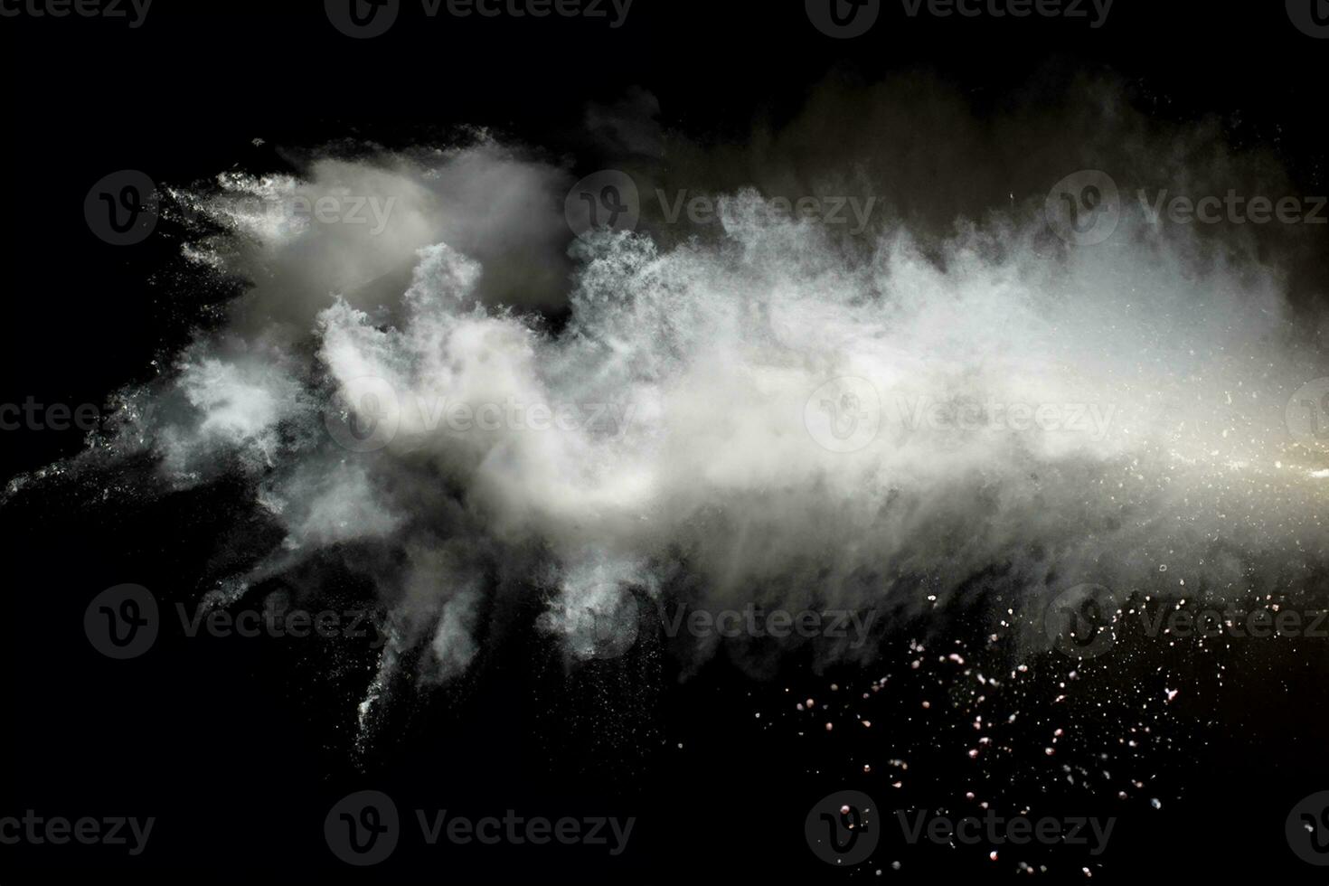 bianca polvere esplosione.congelamento movimento di bianca polvere particelle su nero sfondo. foto