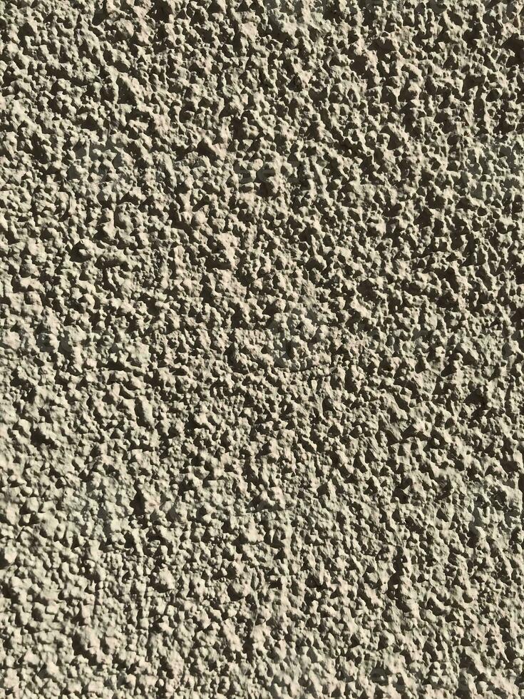 marmo superficie roccia. sporco ruvido calcestruzzo muro.cemento parete strutturato sfondo foto