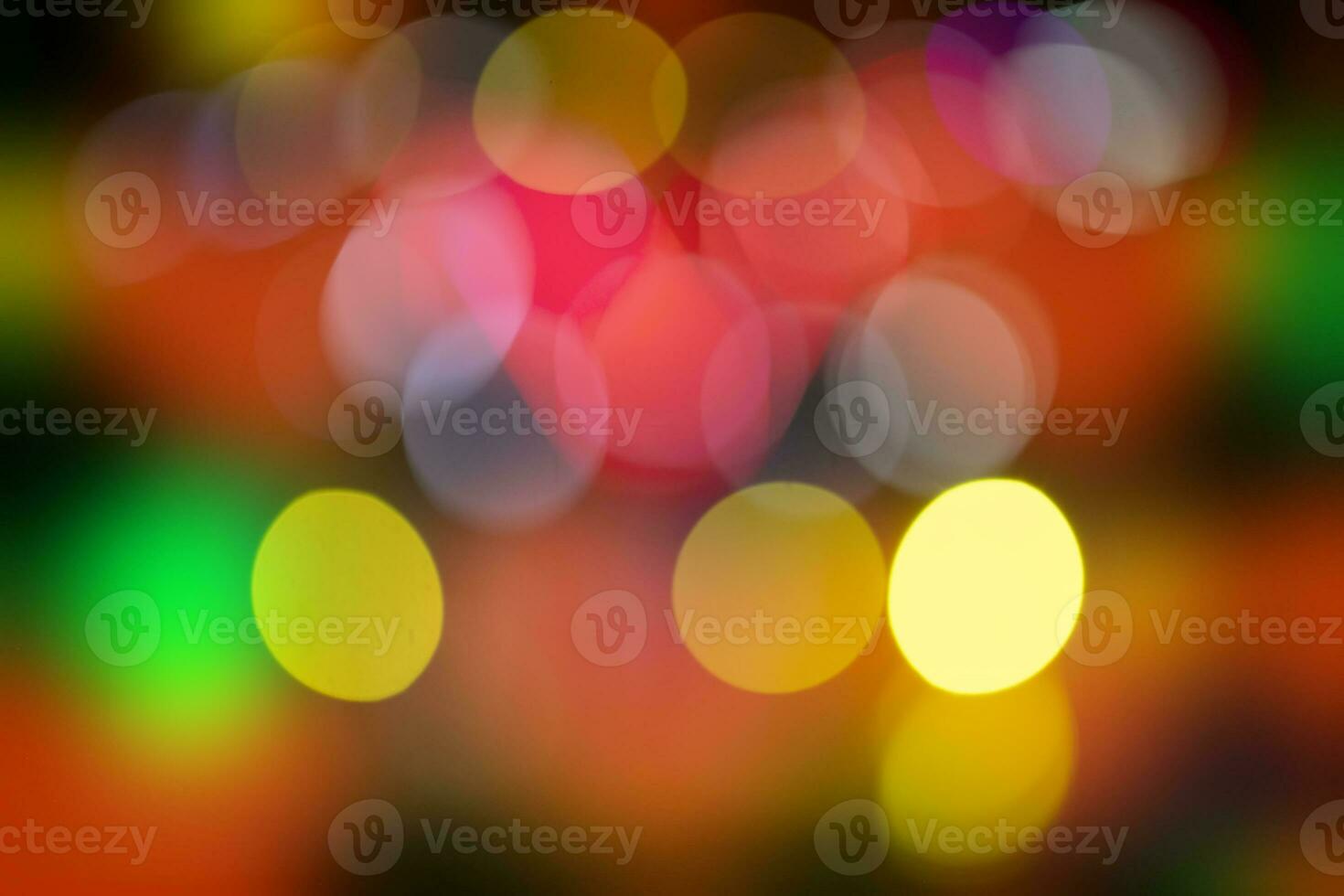 gioioso festivo colorato bokeh macchie per divertimento manifesto. foto